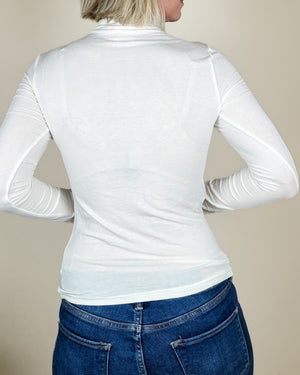 back of mock neck ivory top