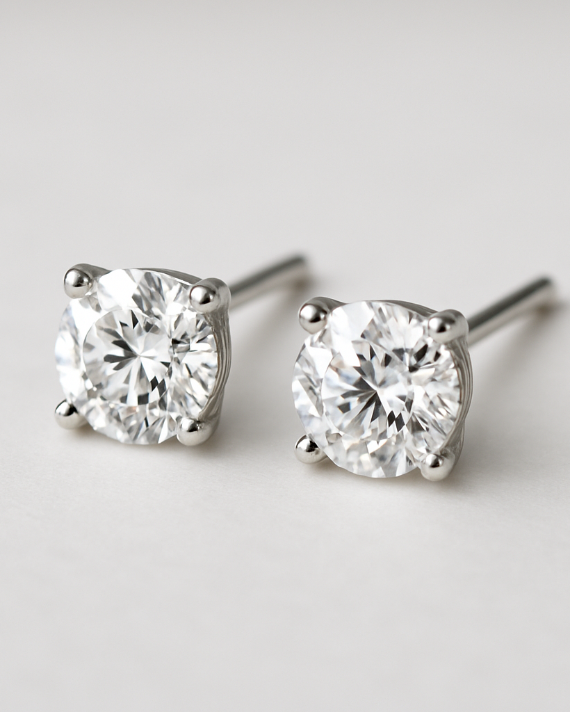 Pair of cz stud earrings on a light gray background