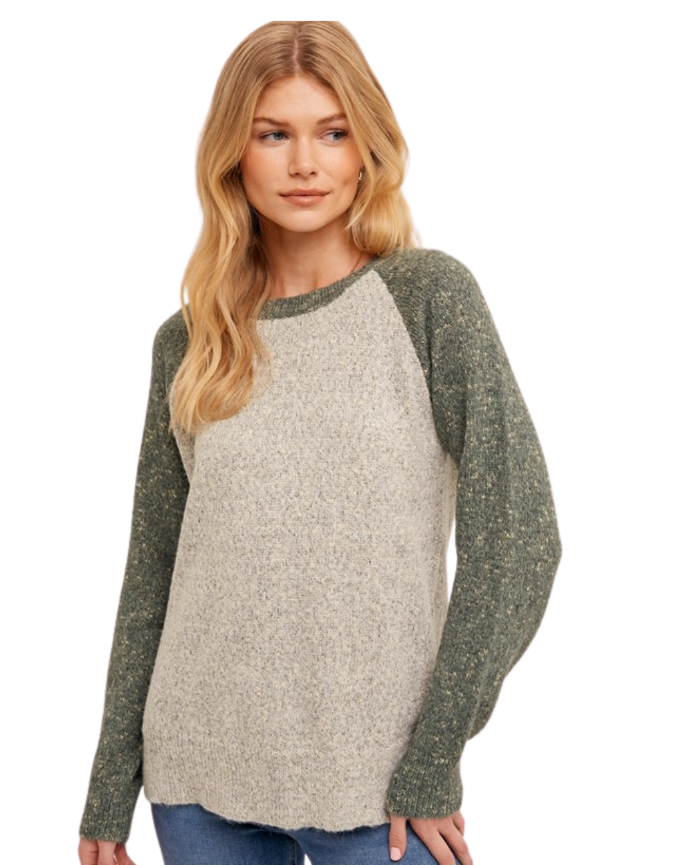Woman wearing a gray and green Raglan sweater on a white background