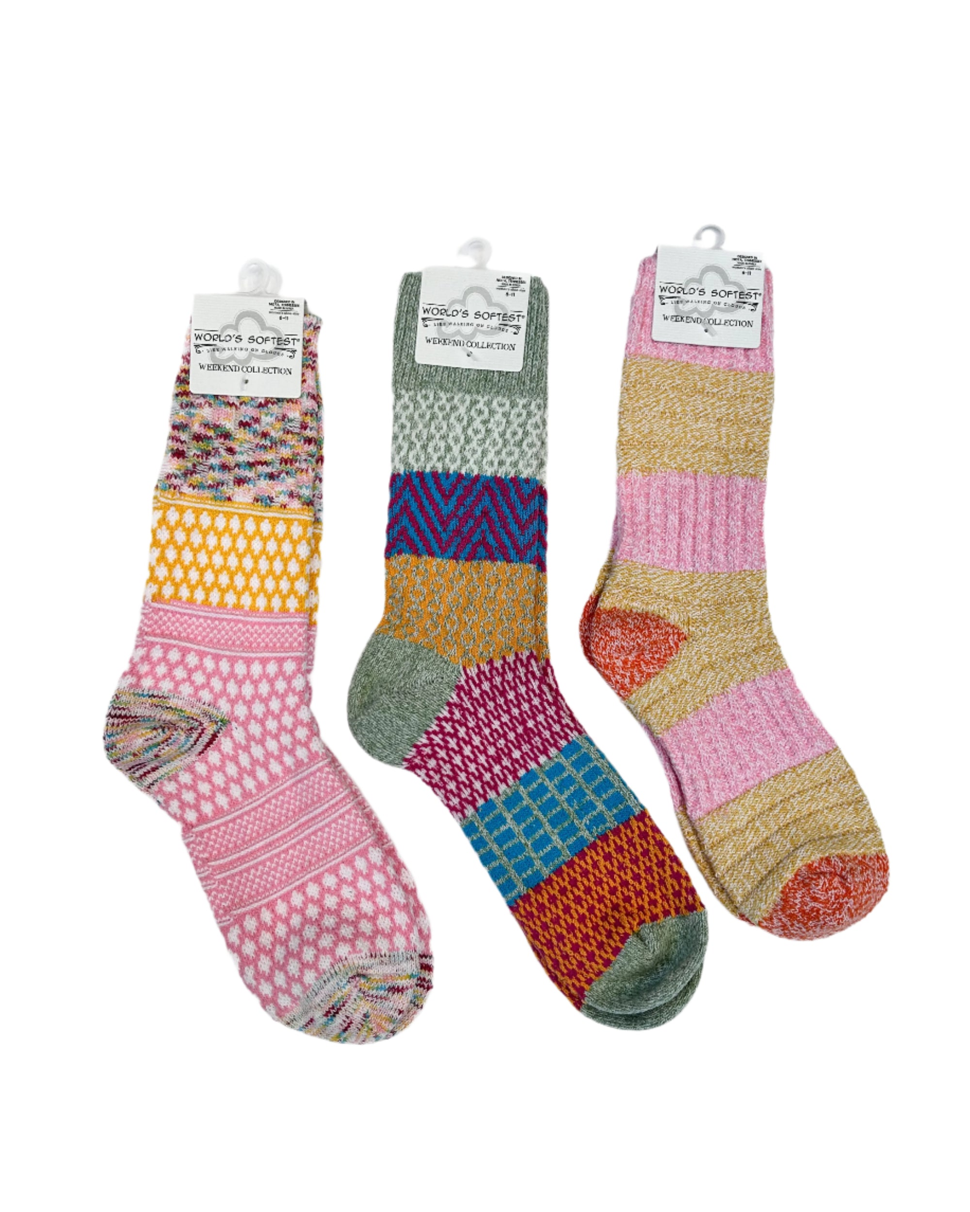 Three pairs of patterned socks on a white background