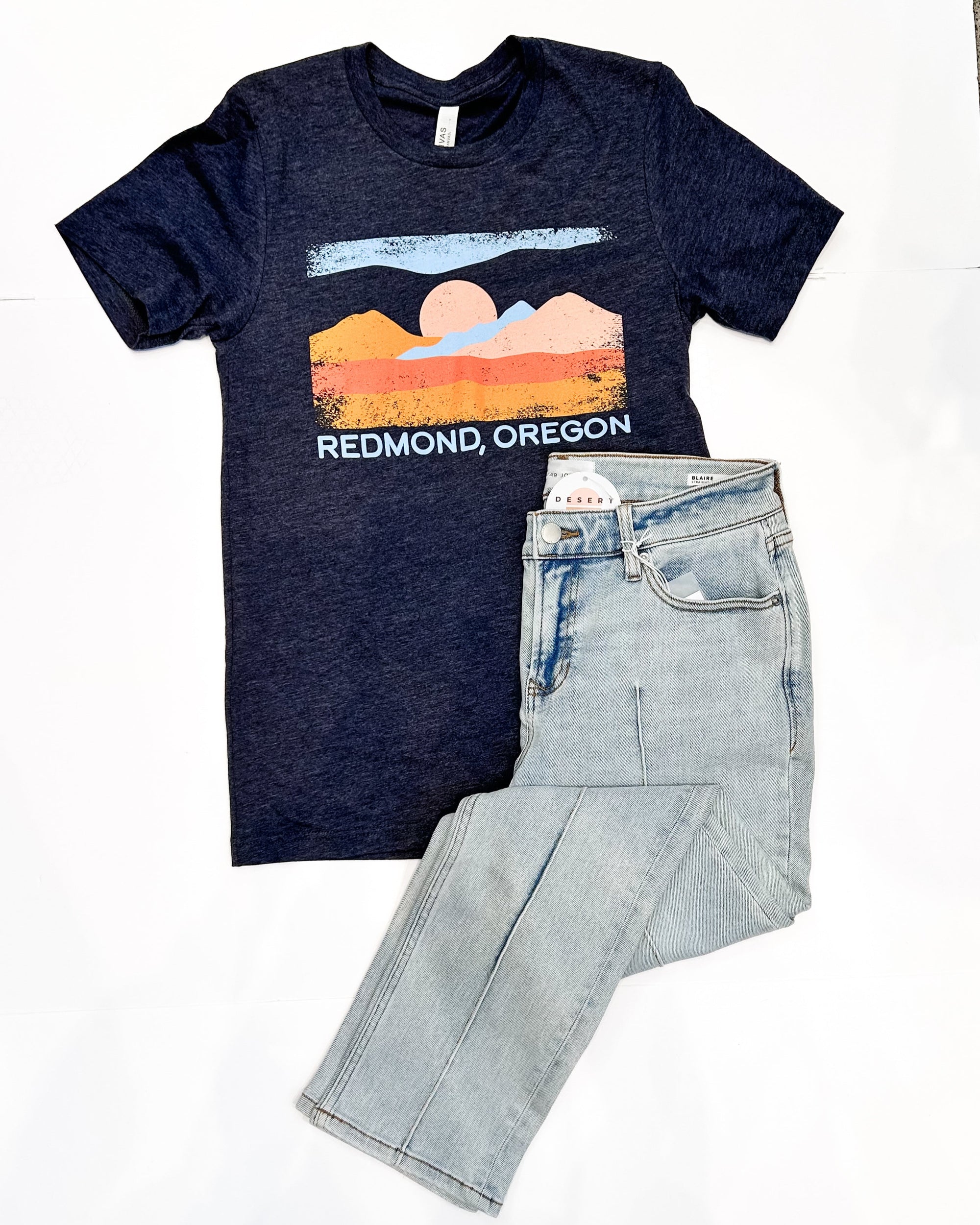 Navy t-shirt with a graphic of Redmond, Oregon on a white background