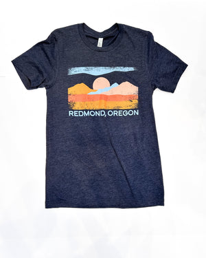 Navy t-shirt with a graphic of Redmond, Oregon on a white background