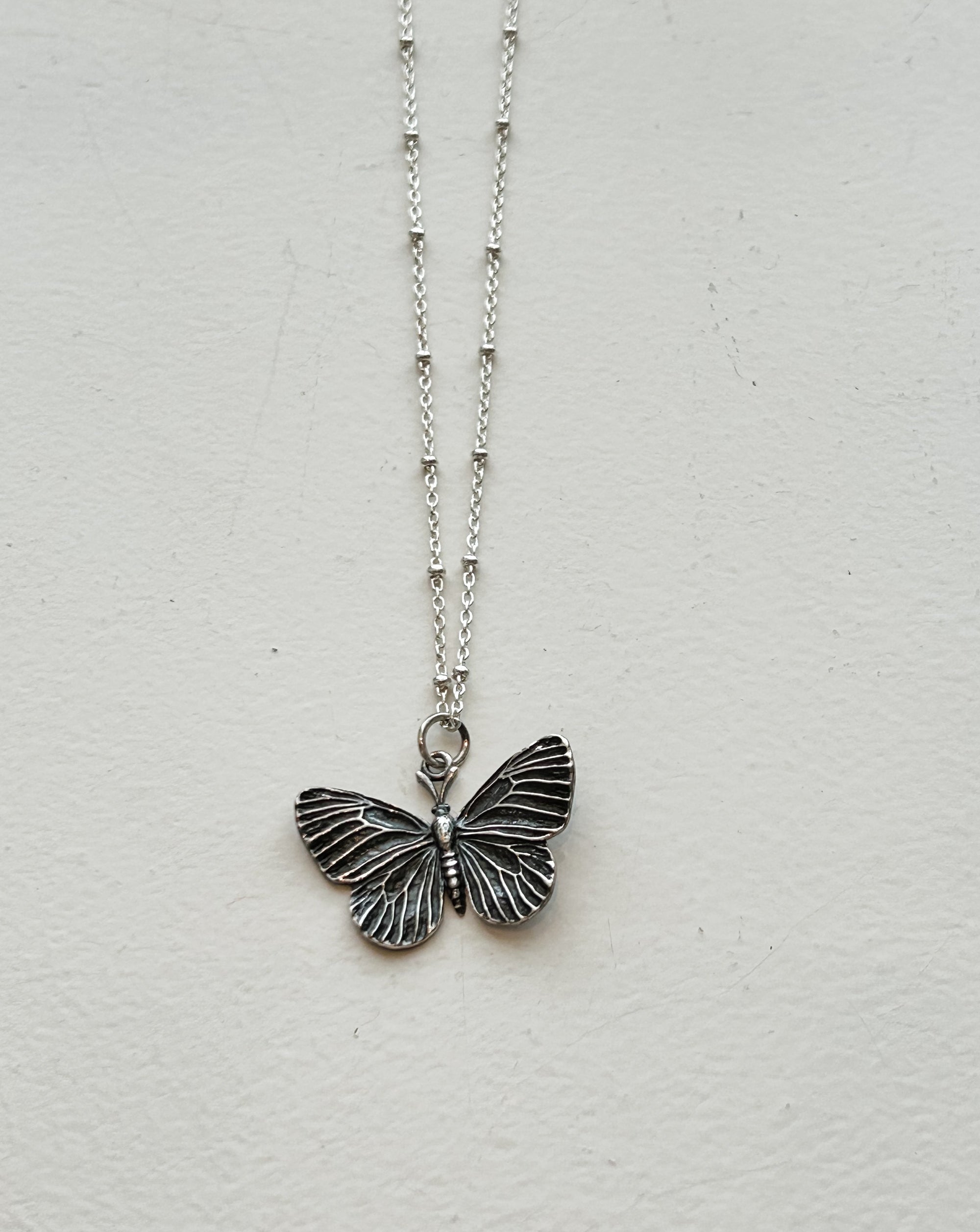 moth necklace