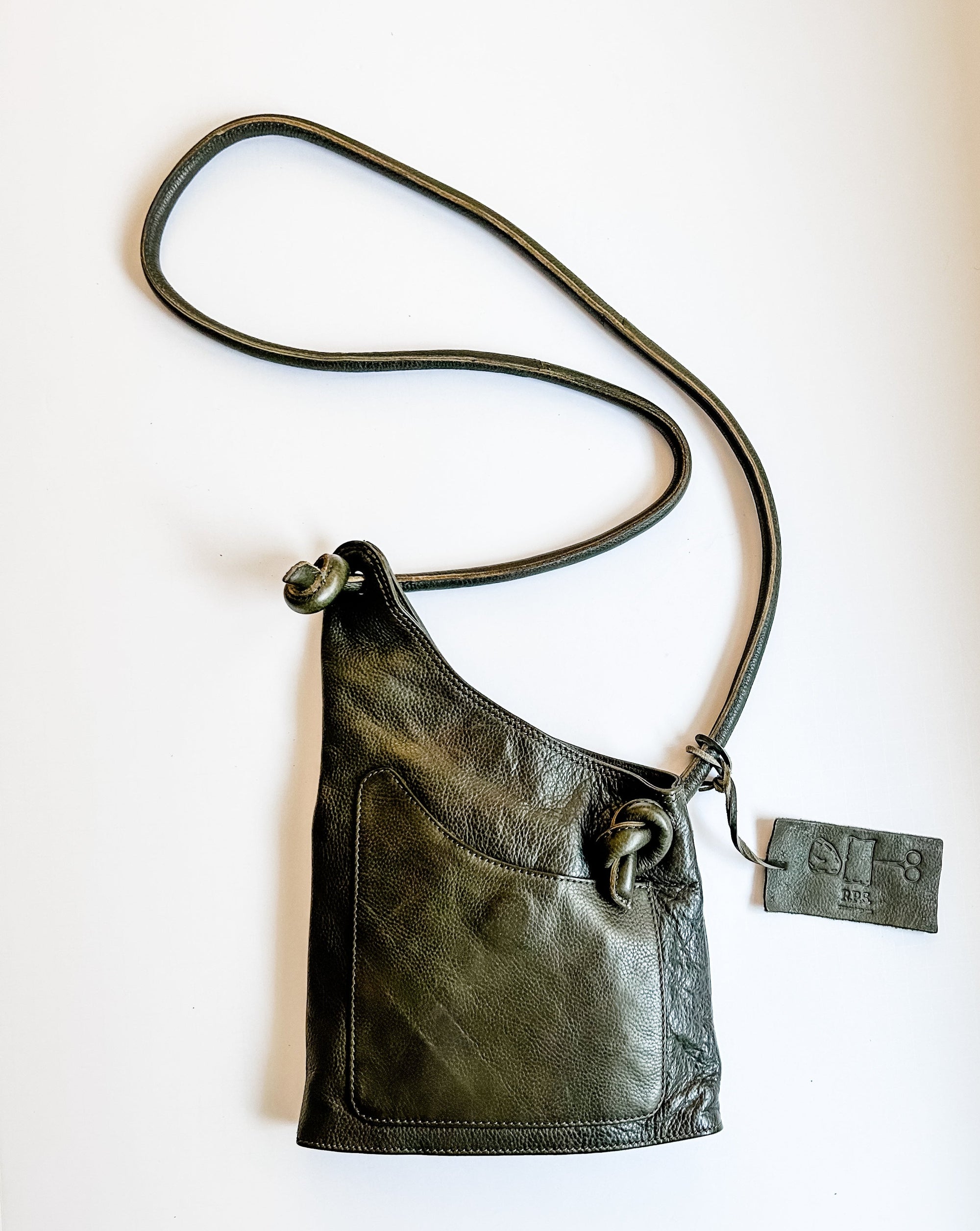 Green L-shaped bag