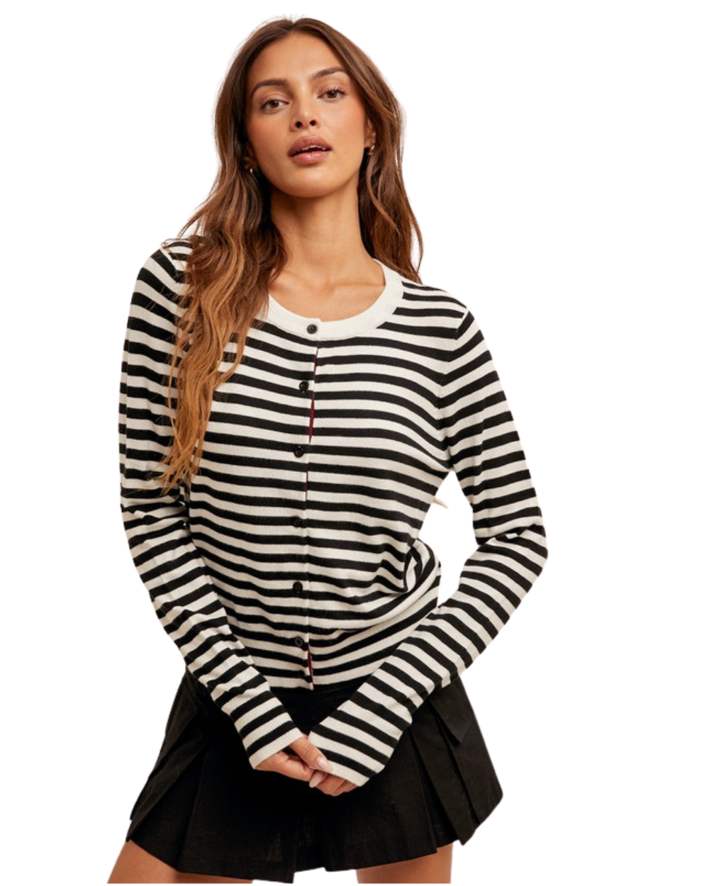 Woman wearing a black and white striped long-sleeve shirt on a white background