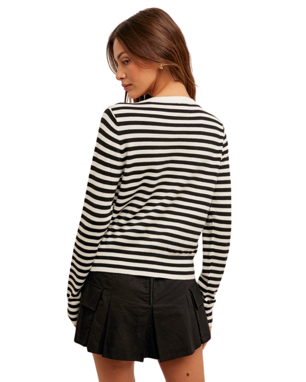 Woman wearing a black and white striped long-sleeve shirt on a white background