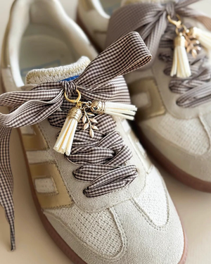 brown tassle shoe charm