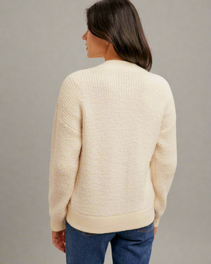 back of ivory bomber sweater