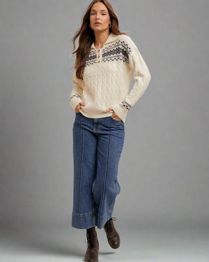 women in ivory sweater