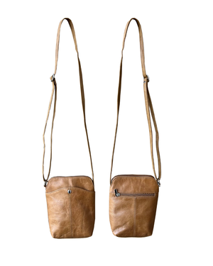 Two brown leather crossbody bags with straps on a white background