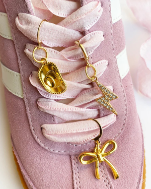 pink laces with charms