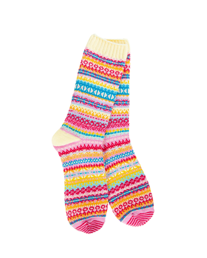 A pair of multicolor patterned crew socks with yellow ribbed cuffs, displayed against a solid white background.