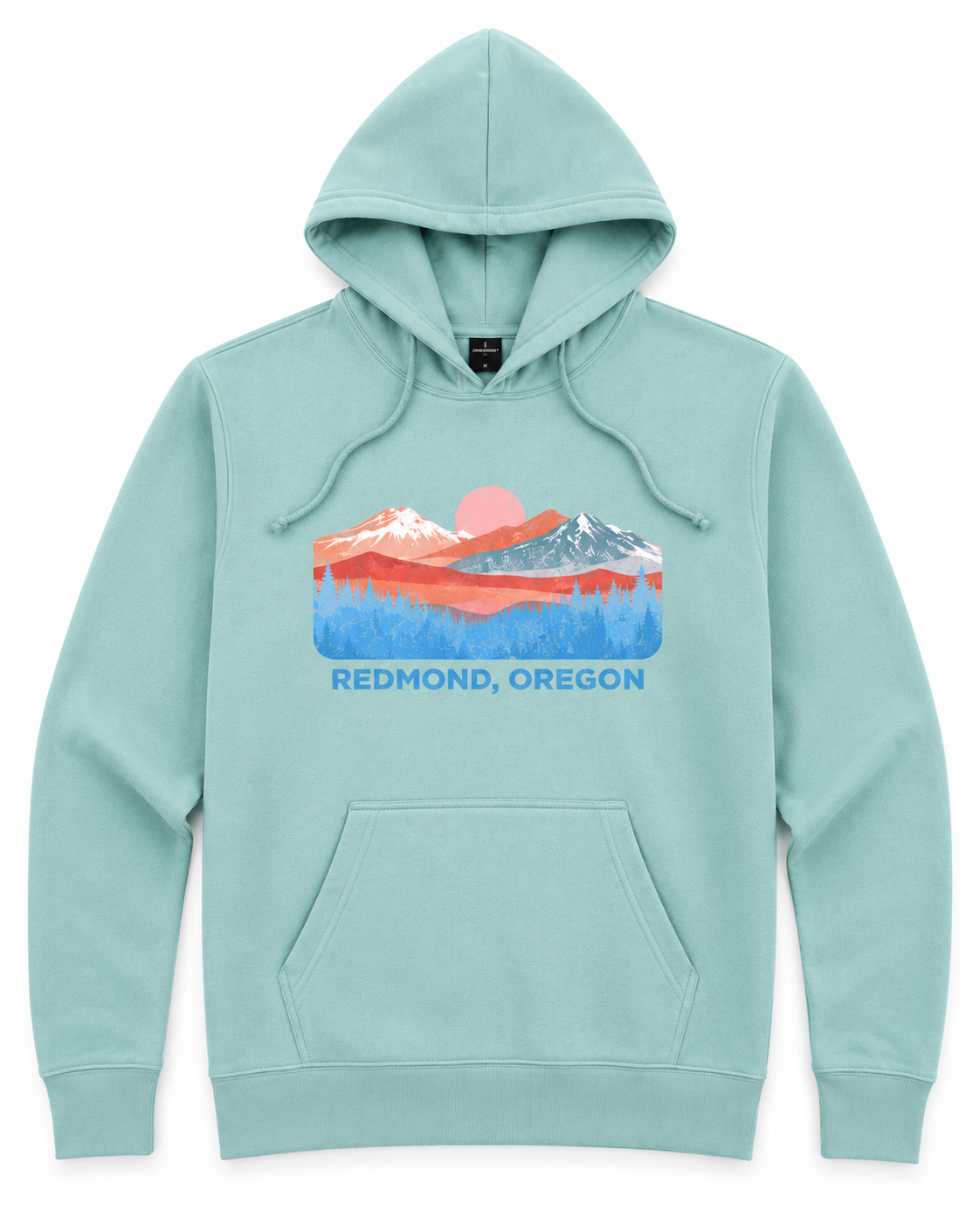 A mint green pullover hoodie with a colorful graphic of a mountain sunset and the text 'REDMOND, OREGON' printed on the chest, displayed on a clean white background.