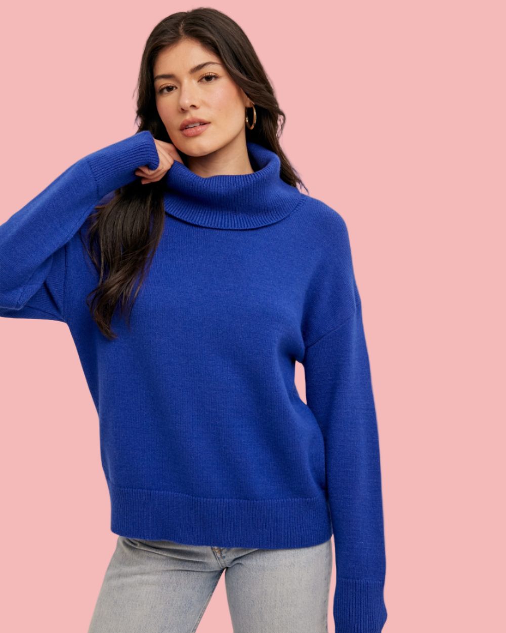 women in blue turtleneck sweater