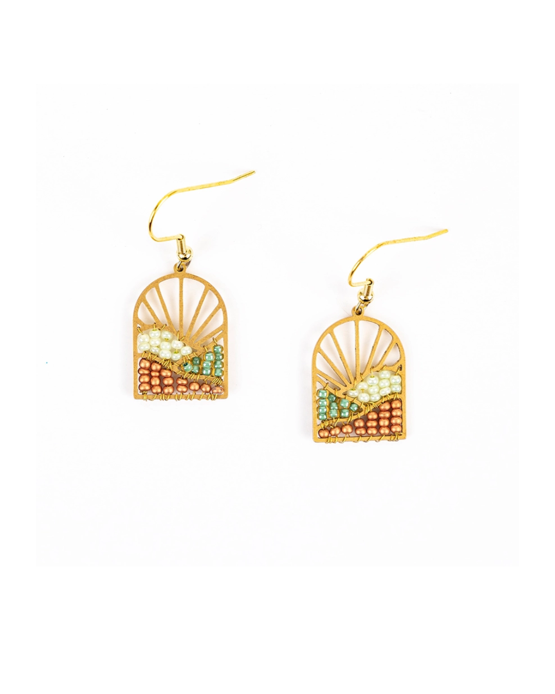 A pair of gold-tone dangle earrings with a fan-shaped top and a rectangular lower section featuring a multicolor landscape design with white, green, and orange details, shown on a plain white background.